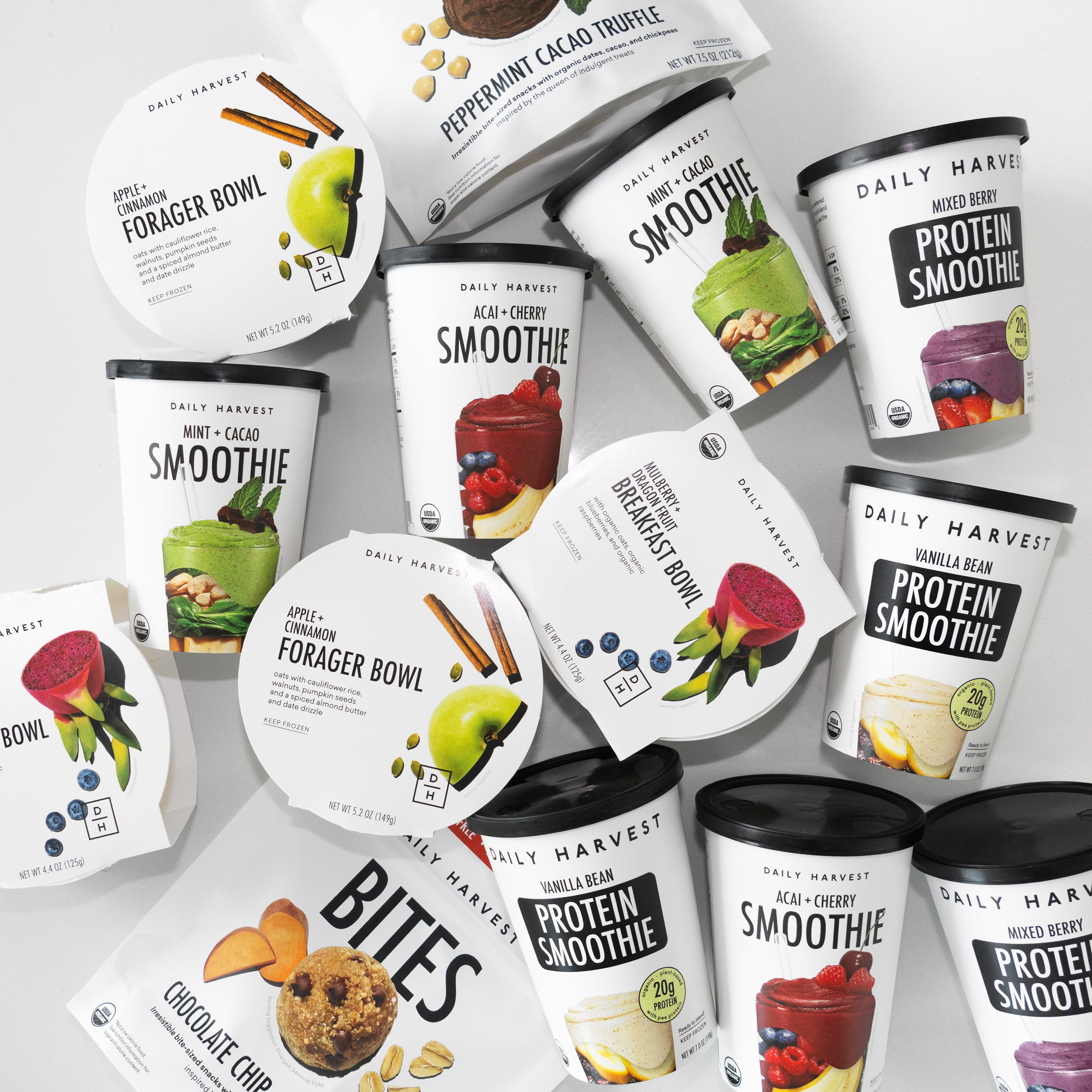 Daily Harvest smoothies, breakfast bowls, forager bowls, and bites displayed on white background
